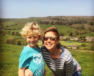 Rebecca Shalts with her son in a field