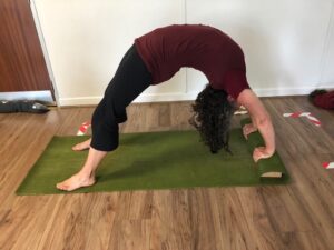 woman doing a yoga backbend