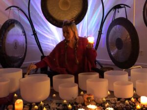 woman playing musical bowls